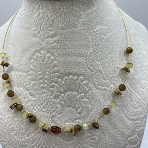 Lia Sophia necklace with semi-precious stones.Gold Tone Neutral colors